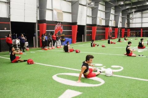 Brownfield football opens with midnight conditioning