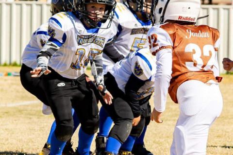 The Wellman-Union 2nd/3rd grade football team are Super Bowl Champions
