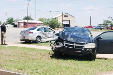 A Dodge Avenger and a Ford Focus collided