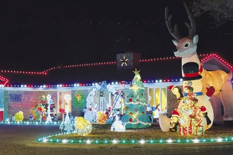 Christmas lights such as this home in Brownfield, light up the night sky nightly. (Melissa McCaghren/ Brownfield News)