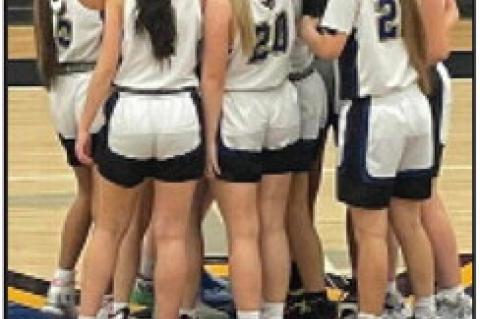 Lady Cubs celebrating three