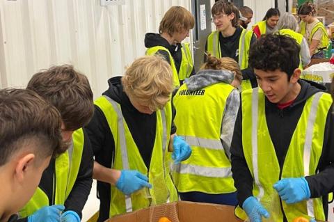 Broncos give back at South Plains Food Bank