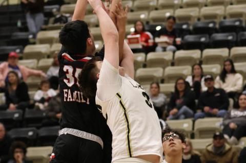 Kaden McPherson rebounding 