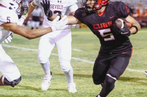 Brownfield’s Asiel Morin (5) prepares to fend off a tackler during a nondistrict game against Lubbock Roosevelt on Friday at Cub Stadium. (COURTESY PHOTO|BROWNFIELD ISD)
