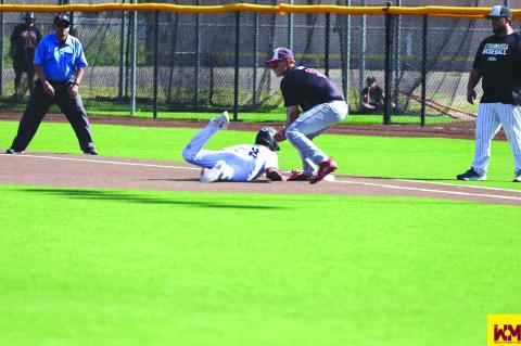 Brownfield first baseman Riley Flores put the tag down on a pickup attempt during the Black-Gold Sports Senior Game at Joe Spikes Fields on Saturday in Lamesa.