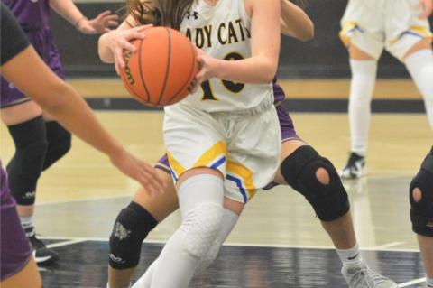 Broncos and Wildcats split in district