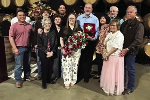 Zayne McPherson is surrounded by family and friends after being named Citizen of the Year at the Brownfield Chamber Banquet &amp; Award Ceremony at The Armory on Thursday in Brownfield.
