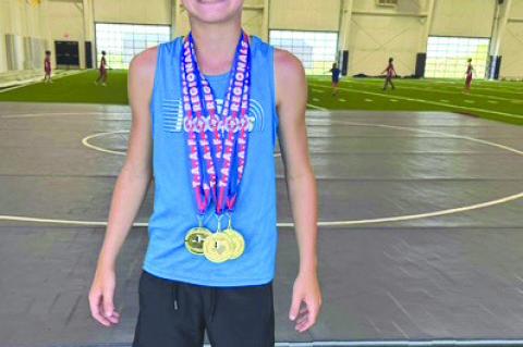 Krey Coleman is a triple gold medalist at the TAAF Region 9 track meet at Plains Capital Park in Lubbock, winning the 800 meters, 1,600 meters and high jump to qualify for the state meet. (PETE CHRISTY|KCBD COURTESY PHOTO)
