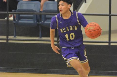 Broncos and Wildcats split in district