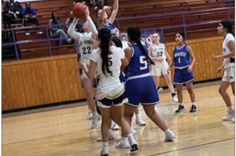 Meadow’s J’me Garcia (22) scores during a District 5-1A game against Amherst on Friday at Meadow High School.