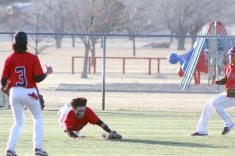 Cubs open district with a road win