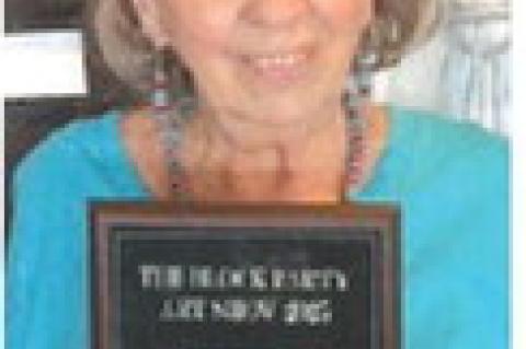 Gail Gilbreath of the Brownfield Art Association shows her Best in Show Award for Fine Arts at The Block Party Art Show on March 29 in Denver City. Gilbreath’s painting is titled “Midnight Madness.” Gilbreath and the rest of the members of the Brown
