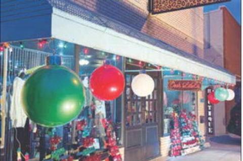 Oooh La La was one of several storefronts decorated with Christmas lights and decor on the parade route. It won best decorated storefront in the annual Christmas Light Parade contest.