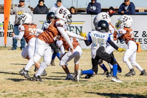 The Wellman-Union 2nd/3rd grade football team are Super Bowl Champions