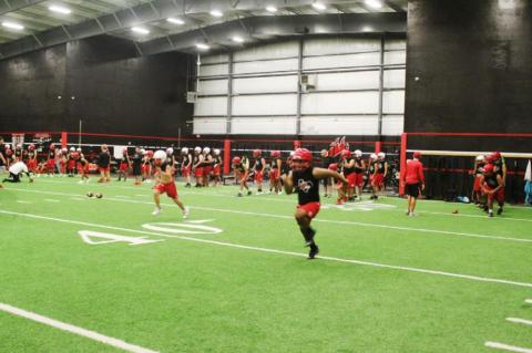 Brownfield football opens with midnight conditioning