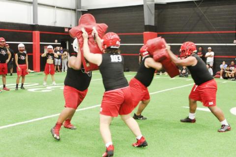 Brownfield football opens with midnight conditioning