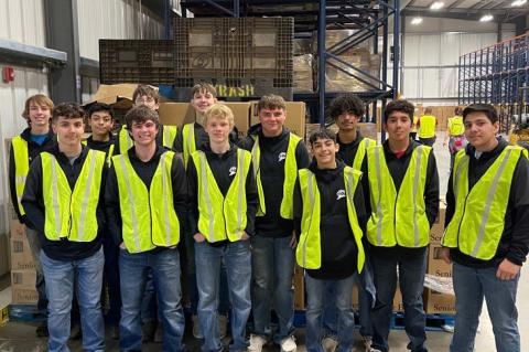 Broncos give back at South Plains Food Bank