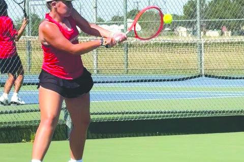 Brownfield's Madilynn Brisendine hits abackhand during amatch against Big Spring on Saturday at Brownfield's tennis courts. (COURTESY PHOTO|RICH HAMMONS)