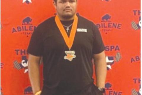 Meadow’s Logan Castaneda poses with his silver medal at the 2025 Texas High School Powerlifting Division 4 State Championships on Saturday at the Taylor County Expo Center in Abilene. (MEADOW ISD | COURTESY PHOTO)
