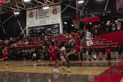 Brownfield’s Quavience Busby (4) puts his shot up off the backboard against Brownfield during a District 3-3A contest on Tuesday at The Pit. (Photos by LEE SCHEIDE | BROWNFIELD NEWS)