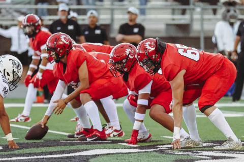 The Brownfield offensive line prepares for a snap against Muleshoe on Friday in Muleshoe