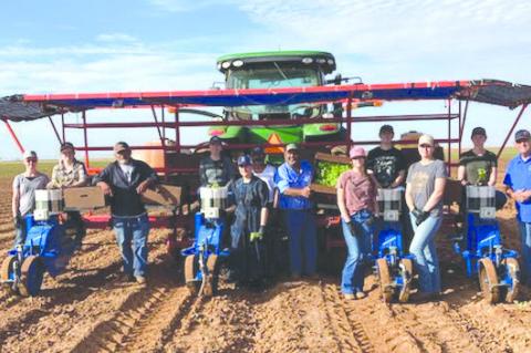 Simpson has a wonderful crew that carefully plants the watermelon plant by using the equipment pulled by the tractor. Simpson grows over 350 acres of watermelons. He estimates the harvest will be 72 days after the plant is put in the ground. Simpson has b