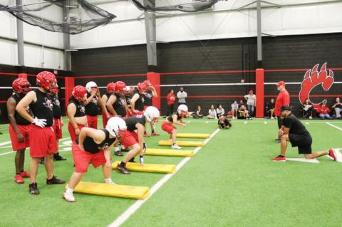 Brownfield football opens with midnight conditioning