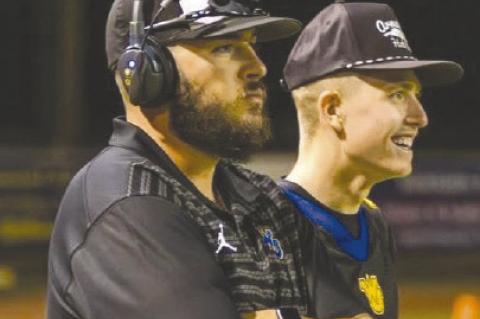 Wellman-Union assistant coach Brett Labadie (left) watches a play during the 2024 season. (COURTESY PHOTO)