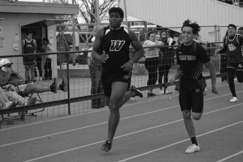 Wellman-Union’s Elijah DePoyster chased down Nate Samson of Whitharral to win the Boys 100 meters at the District 5-1A Championships on Wednesday at Wellman-Union High School.