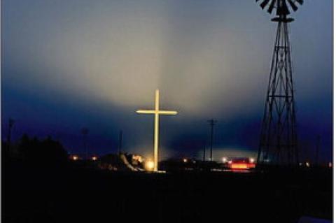 The Cross and tomb as seen at night from the property of Monty and Kathy Henson on Plains Highway west of Brownfi eld. The Hensons put up the cross 10 years ago and added the tomb the following year to provide a spot for people to pray, worship and reflec