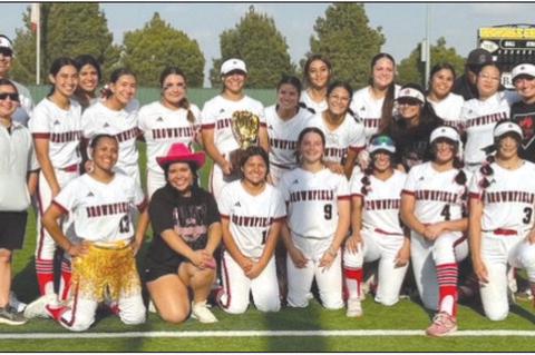 The Brownfield softball team poses for a picture after defeating Kermit, 10-0, to win the Class 3A Division I Bi-District playoff series on Friday at Seminole ISD Softball Field in Seminole. (BROWNFIELD ISD)