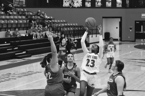 Caylee Stell attempts to make a basket Monday during the Lady Cubs’ game against Monahans. (Melissa McCaghren/Brownfield News)