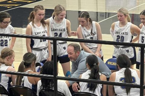 Lady Cubs celebrating three