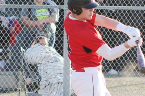 Cubs open district with a road win
