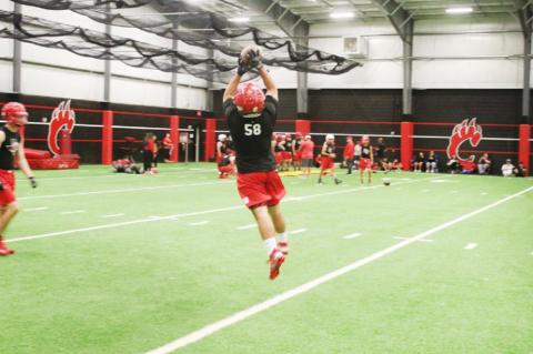 Brownfield football opens with midnight conditioning