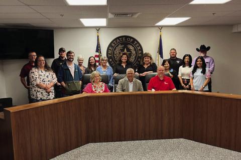 City of Meadow Mayor Natalie Howard (seated from left to right), Terry County Judge Tony Serbantez and City of Brownfield Mayor Eric Horton at joined by Terry County officials after the trio signed a proclamation to recognize April 2025 as Child Abuse Pre