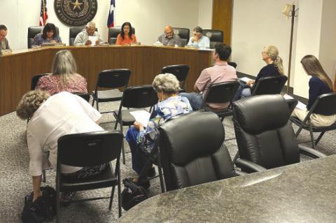 Terry County Commissioners review county billing on Monday at the courthouse. (News staff photo)