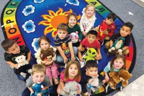 Wellman-Union thanked Angie Cavazos in the cafeteria for bringing stuffed animals for the PreK, Kindergarten, and First graders to enjoy. The School said the students were excited to pick one out to take home. (Photo courtesy WUISD)