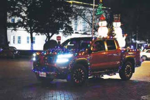 Vehicles of all shapes and sizes were adorned in Christmas lights and decorations for the annual Christmas Light Parade Monday evening in Downtown. (Photos by Melissa McCaghren/Brownfield News)