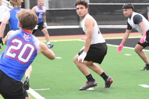 Brownfield’s Asiel Morin (center) and Joby Rodriguez (right) defend during a 7-on-7 game against Midland Christian on June 9 at Wigwam Stadium in Seminole. (COURTESY PHOTO)