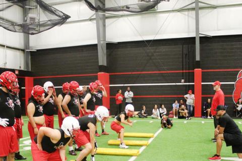 Brownfield football opens with midnight conditioning