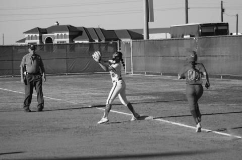 Brownfield first baseman Kenzie Gutierrez (10) records an out on a ground ball by Denver City’s Yuri Torres (00) in the District 3-3A opener for both teams on Tuesday at Brownfield High School.