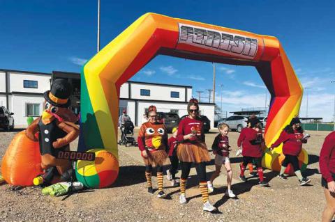 Runners enjoy wine, fun at annual Gobble Wobble Wine Run