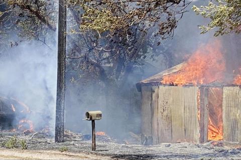 Local fire departments fight house fire