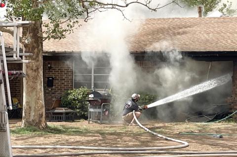 CAR CRASHES THROUGH HOME