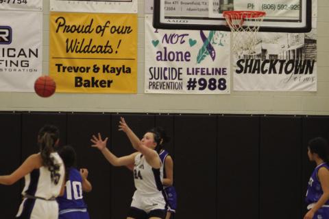 Wellman-Union’s Alyssa Cavazos (24) for a pass against Amherst in a District 5-1A game on Friday at Wellman-Union High School. (Photos by Lee Scheide | Brownfield News)