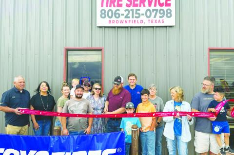 Advance Tire Service has ribbon cutting