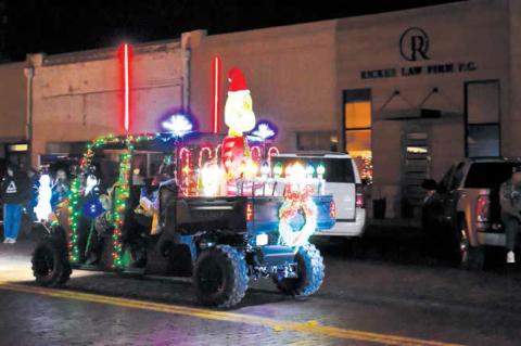A vehicle decorated with Grinch lights traverses the parade route for guests to enjoy Monday evening during the annual Christmas Light Parade. Entrants had the opportunity to win awards. (Photos by Melissa McCaghren/Brownfield News)