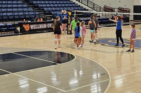 The Wellman-Union football and volleyball programs