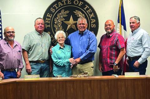 Jackie Pate of the Terry Soil and Water Conservation District (center) stands with Terry County judge Tony Serbantez and the rest of the County Commissioners after a proclamation was approved designating April 27 to May 3 as Soil and Water Stewardship Wee